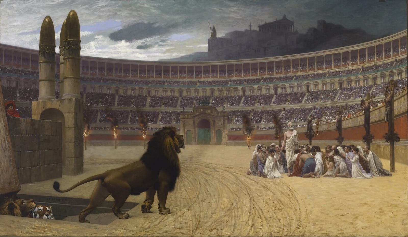 Christians kneeling in prayer on the floor of a Roman arena